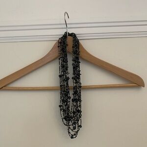 12 strand black and crystal beaded necklace